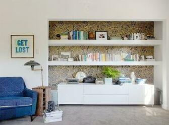 Oh Joy Wallpaper In Black Gold Behind This Shelving Area Styled By