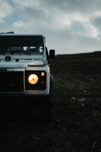 White Car On Black Soil Photo Land Rover Defender Image