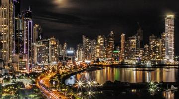 City Lights And Buildings During Nighttime Photo Image On