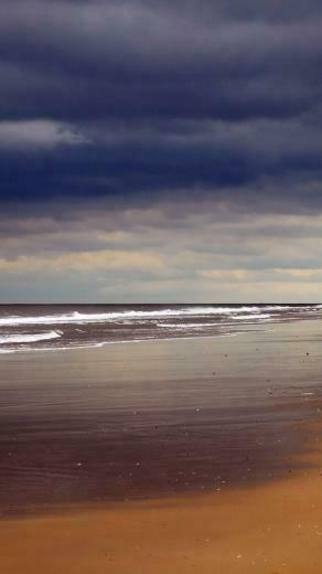 Storm Beach iPhone Wallpaper