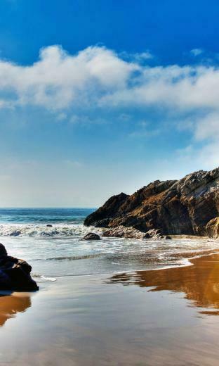 The Wallpaper Of Beach At Pacific Ocean In Malibu California