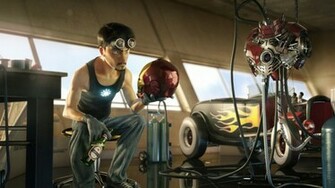 Tony Stark Working On His Iron Man Suit Wallpaper
