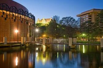 Texas State University At Night Featuring The Theatre Center And Old