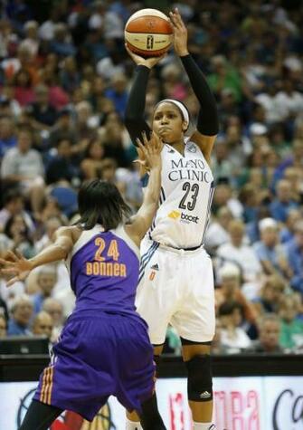 Minnesota Lynx Forward Maya Moore Shoots The Ball Against Phoenix