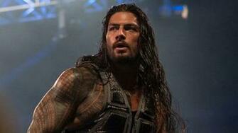 Roman Reigns On Making The Spear His Own Triple H Jon Jones Photo