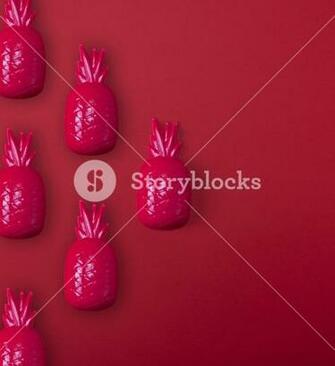 Red Plastic Pineapple Childrens Toy On A Background Copy
