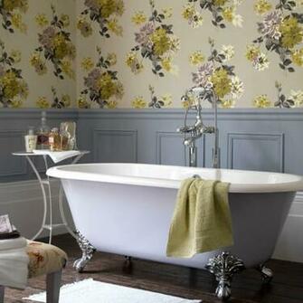 Standing Purple Bath With Grey Painted Walls And Floral Wallpaper