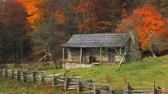 Log Cabin Window Wallpaper Brightly Fall Colored Trees