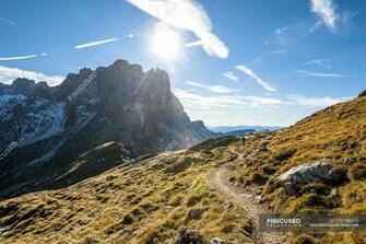 Of Mountain Trail And Rocks On Background During Daytime
