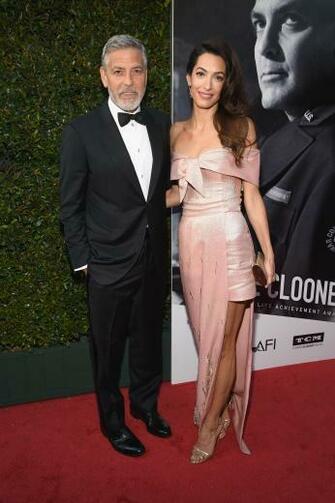 George Clooney Hobbles Onto Plane With Amal In First Sighting