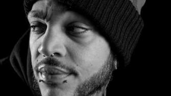 Wallpaper Travie Mccoy Piercing Hat