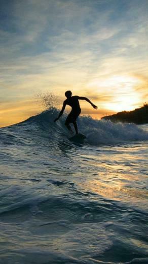 Surfing At Twilight iPhone Plus And Wallpaper