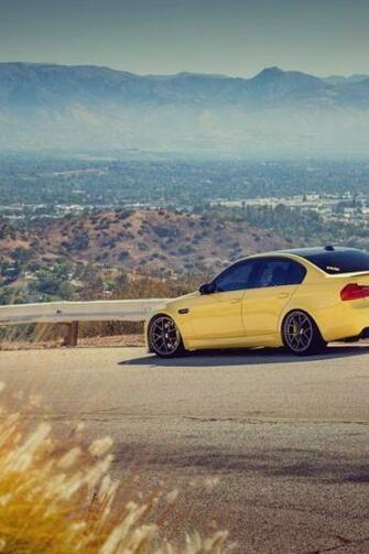 Yellow Bmw M3 E90 Mountain Road iPhone Wallpaper
