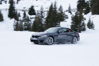 Bmw M4 Drifts In Snow At Driving Experience Wallpaper