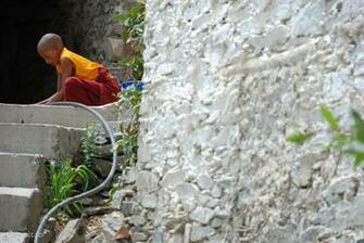 Tibetan Buddhist Lama In A Monastery Wallpaper