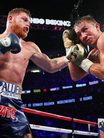 Saul Canelo Alvarez Giving A Hard Punch Wallpaper