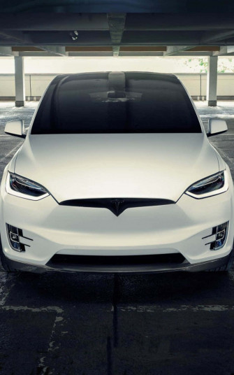 Experience The Future Of Smartphones With Tesla iPhone