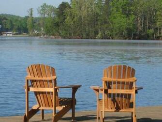 Adirondack Chairs On Beach Waiting For