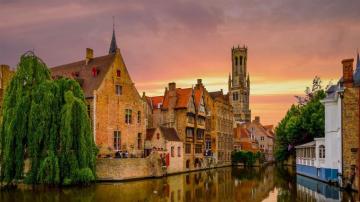 Buildings And Church Along A Canal In Bruges Belgium HD Wallpaper