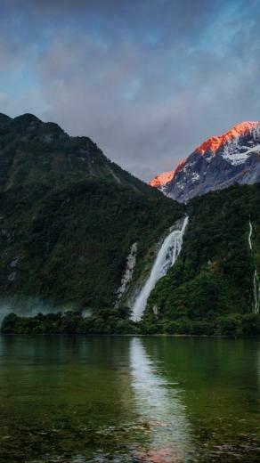 Waterfalls Mountains Sunset Lake Beach Foliage Plants Sky