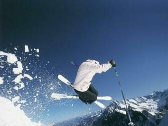 Skiing In Mountains Wallpaper