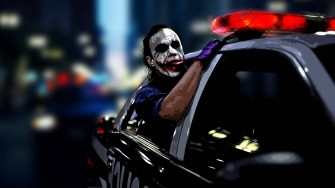 Joker 4k Ultra HD In Police Car Wallpaper