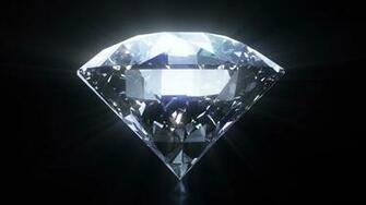 Spinning Glowing Diamond On Black Background With Mask Stock Video