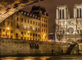 Notre Dame Cathedral From Paris Lighted In Night