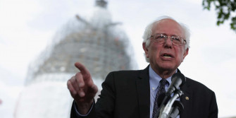 Bernie Sanders Speakingat Podium Wallpaper