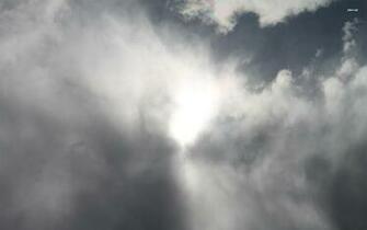 Sun Shining Through Clouds Wallpaper