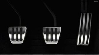 Clutch Brake And Accelerator Closeup Black Background Wallpaper