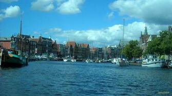 Wallpaper With Boats In The Canals Of Haarlem On An Average Day