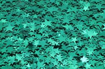 Colorful Background Of Sparkling Reflective Green Metallic Stars