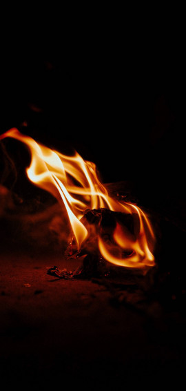 iPhone Fire In The Dark Wallpaper