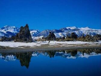 Snow Covered Mountainsides Holding The Sky On Them Raise You Up To
