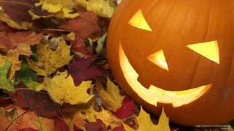 Holidays Wallpaper Jack O Lantern In Autumn Leaves