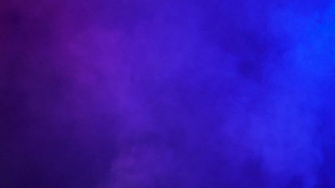 Abstract Colorful Smoke And Fumes Over A Black Background Stock