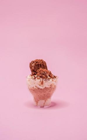 Brown Ice Cream Cone On White Table Photo Image