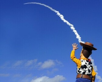 Woody Waving To Rocket Wallpaper Toy Story