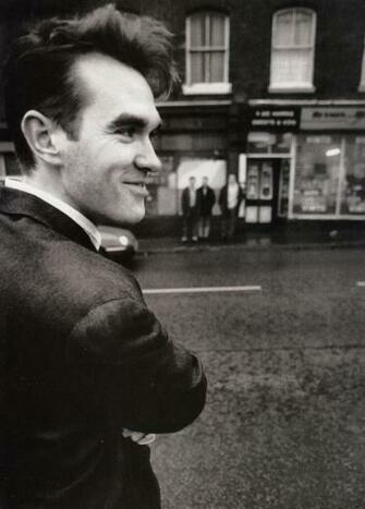 Morrissey And In The Background Johnny Marr Andy Rourke Mike