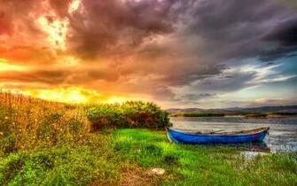 Canoe On The Lake At Sunset Full HD Wallpaper And