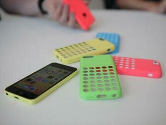 Yellow iPhone 5c And New Cases From Apple Wallpaper Image