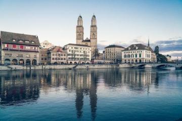 Zurich In Switzerland Under White Sky During Daytime Photo