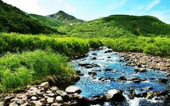 Small River In Green Hills HD Desktop Wallpaper