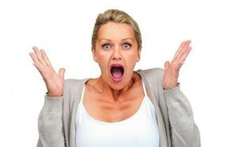 Surprised Woman Isolated Against White Background