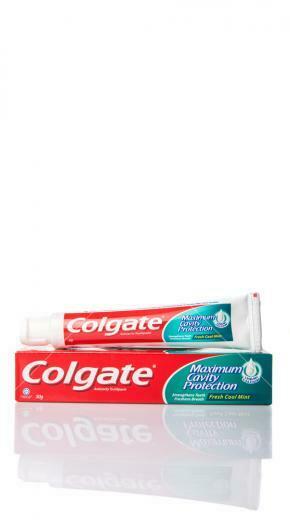 Colgate Toothpaste Over White Background Royalty Stock Image