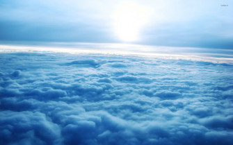 Sunrise Over The Clouds Wallpaper