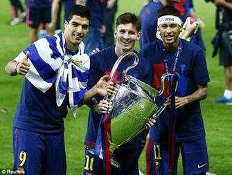 Luis Suarez Lionel Messi And Neymar Celebrate With The Trophy