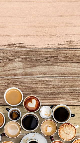 Mixed Coffee Cups On A Pastel Pink And Brown Wooden Panel