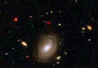 Hubble Visible Light And Near Infrared Of A Baby Galaxy In The